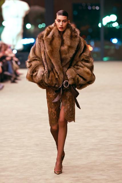 (260304) -- PARIS, March 4, 2026 (Xinhua) -- A model presents a creation from the ready-to-wear Fall/Winter 2026-2027 collections by Saint Laurent during the Paris Fashion Week in Paris, France, on March 3, 2026. (MeetEurope/Handout via Xinhua)