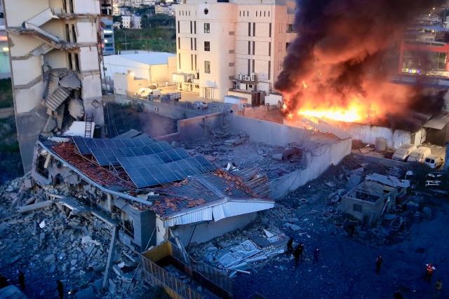 (260304) -- SIDON, March 4, 2026 (Xinhua) -- This photo taken on March 3, 2026 shows the fierce fire and dense smoke at the site of the Islamic Group's offices destroyed by Israeli airstrikes in Sidon, southern Lebanon. (Photo by Ali Hashisho/Xinhua)