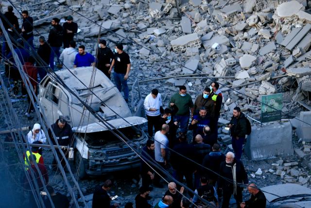 (260304) -- SIDON, March 4, 2026 (Xinhua) -- Rescuers work at the site of the Islamic Group's offices destroyed by Israeli airstrikes in Sidon, southern Lebanon, March 3, 2026. (Photo by Ali Hashisho/Xinhua)