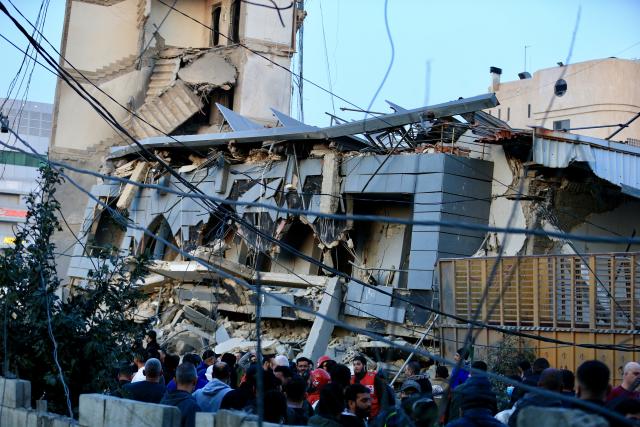 (260304) -- SIDON, March 4, 2026 (Xinhua) -- Rescuers work at the site of the Islamic Group's offices destroyed by Israeli airstrikes in Sidon, southern Lebanon, March 3, 2026. (Photo by Ali Hashisho/Xinhua)