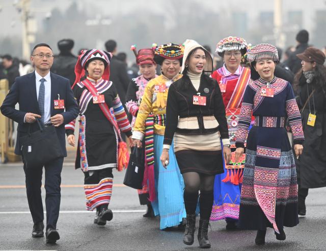 (260304) -- BEIJING, March 4, 2026 (Xinhua) -- Members of the 14th National Committee of the Chinese People's Political Consultative Conference (CPPCC) walk towards the Great Hall of the People for the opening meeting of the fourth session of the 14th CPPCC National Committee in Beijing, capital of China, March 4, 2026. (Xinhua/Jin Liangkuai)
