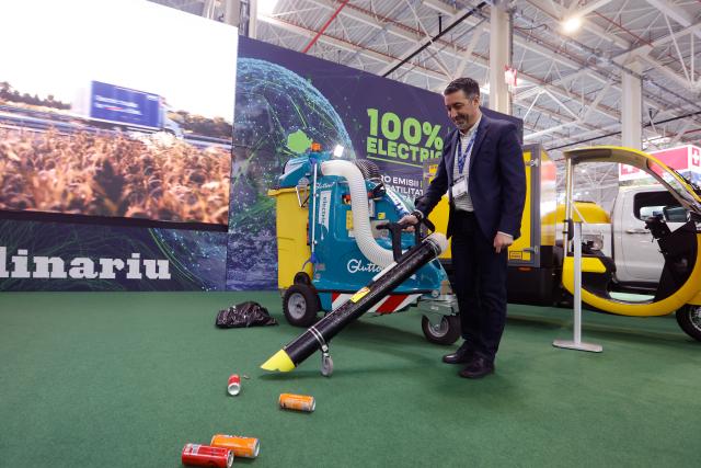 (260304) -- BUCHAREST, March 4, 2026 (Xinhua) -- An exhibitor demonstrates a street vacuum cleaner during the first day of the Green Energy Expo & Romenvirotec event at Romexpo in Bucharest, Romania, March 3, 2026.
  The event is a regional platform for technologies in green energy, water, waste and sustainable cities. (Photo by Cristian Cristel/Xinhua)