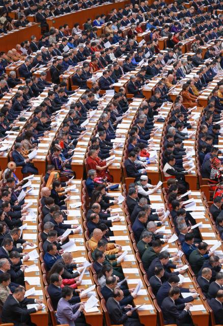 (260304) -- BEIJING, March 4, 2026 (Xinhua) -- The opening meeting of the fourth session of the 14th Chinese People's Political Consultative Conference (CPPCC) National Committee is held at the Great Hall of the People in Beijing, capital of China, March 4, 2026. (Xinhua/Wang Ye)