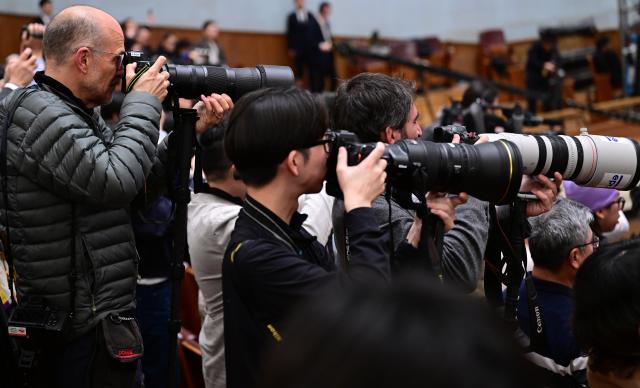 (260304) -- BEIJING, March 4, 2026 (Xinhua) -- Journalists work at the opening meeting of the fourth session of the 14th Chinese People's Political Consultative Conference (CPPCC) National Committee at the Great Hall of the People in Beijing, capital of China, March 4, 2026. (Xinhua/Chen Yehua)