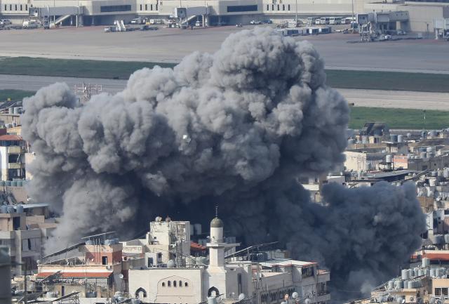(260304) -- BEIRUT, March 4, 2026 (Xinhua) -- Smoke rises from buildings following Israeli bombing near the Rafic Hariri International Airport in Beirut, Lebanon, March 4, 2026. Tensions between Lebanon and Israel have escalated in recent days, with intensified airstrikes and exchanges of fire along the border, leading to mounting casualties, widespread displacement, and growing pressure on emergency response systems. (Photo by Bilal Jawich/Xinhua)
