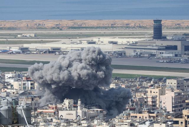 (260304) -- BEIRUT, March 4, 2026 (Xinhua) -- Smoke rises from buildings following Israeli bombing near the Rafic Hariri International Airport in Beirut, Lebanon, March 4, 2026. Tensions between Lebanon and Israel have escalated in recent days, with intensified airstrikes and exchanges of fire along the border, leading to mounting casualties, widespread displacement, and growing pressure on emergency response systems. (Photo by Bilal Jawich/Xinhua)