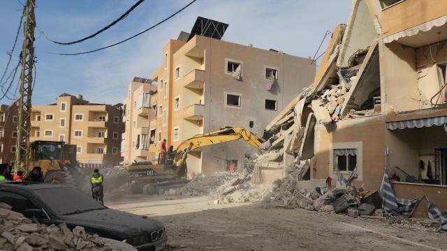 (260304) -- BAALBEK, March 4, 2026 (Xinhua) -- Rescuers search on ruins of a residential complex attacked by an Israeli airstrike in Baalbek, Lebanon, March 4, 2026. In eastern Lebanon, five people were killed and 15 others injured in an Israeli airstrike on a residential complex in the city of Baalbek, the state-run National News Agency reported. (Photo by Taher Abu Hamdan/Xinhua)
