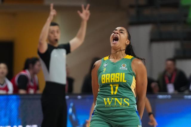 (260304) -- CHANGSHA, March 4, 2026 (Xinhua) -- Carina dos Santos Martins of Brazil celebrates during a warm-up match between China and Brazil in Changsha, central China's Hunan Province, on March 4, 2026. (Xinhua/Chen Zhenhai)