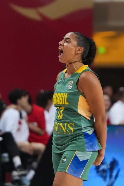 (260304) -- CHANGSHA, March 4, 2026 (Xinhua) -- Carina dos Santos Martins of Brazil celebrates during a warm-up match between China and Brazil in Changsha, central China's Hunan Province, on March 4, 2026. (Xinhua/Chen Zhenhai)