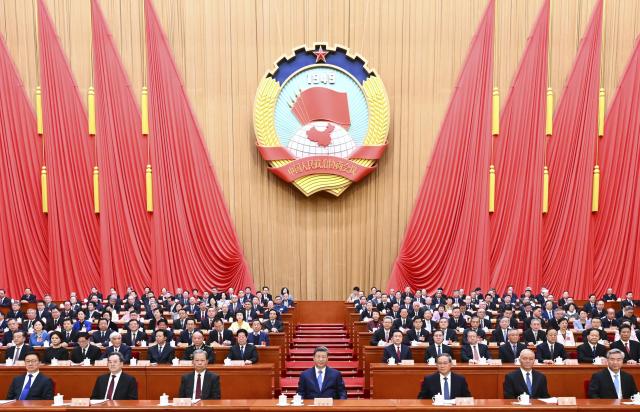 (260304) -- BEIJING, March 4, 2026 (Xinhua) -- The fourth session of the 14th National Committee of the Chinese People's Political Consultative Conference (CPPCC) kicks off at the Great Hall of the People in Beijing, capital of China, March 4, 2026. Chinese President Xi Jinping and other leaders including Li Qiang, Zhao Leji, Cai Qi, Ding Xuexiang, Li Xi and Han Zheng were seated on the rostrum. (Xinhua/Yan Yan)