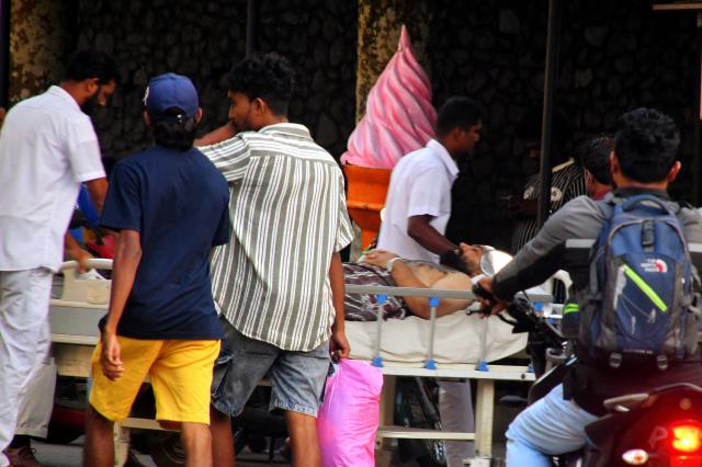 (260304) -- GALLE, March 4, 2026 (Xinhua) -- A wounded crew member on board the Iranian frigate IRIS Dena is transferred to a hospital in Galle, Sri Lanka, March 4, 2026. At least 100 people were feared dead on board the Iranian frigate IRIS Dena after the vessel sustained a possible submarine attack off the Sri Lankan coast on Wednesday morning, according to Sri Lankan navy sources.
   Local media earlier reported that around 180 people were on board the frigate. Sri Lanka Navy launched rescue operations immediately after receiving a distress call reporting that the vessel was sinking. A total of 35 people from the frigate were rescued and transferred to the Karapitiya Teaching Hospital in the southern city of Galle. (Photo by Ajith Perera/Xinhua)