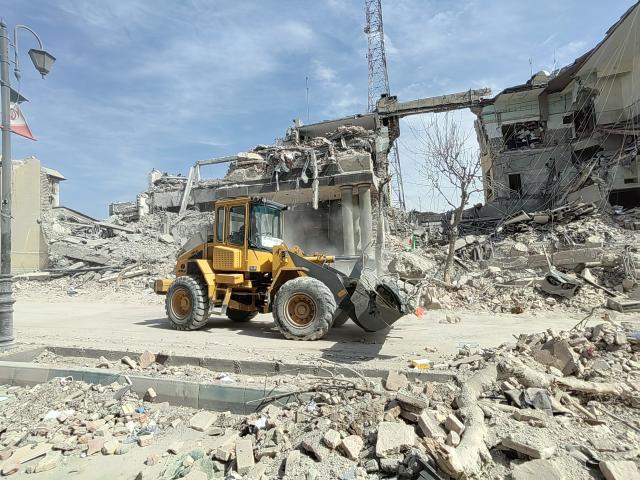 (260304) -- TEHRAN, March 4, 2026 (Xinhua) -- This photo taken on March 4, 2026 shows damaged buildings near the Enghelab Square in Tehran, Iran. (Xinhua/Shadati)
