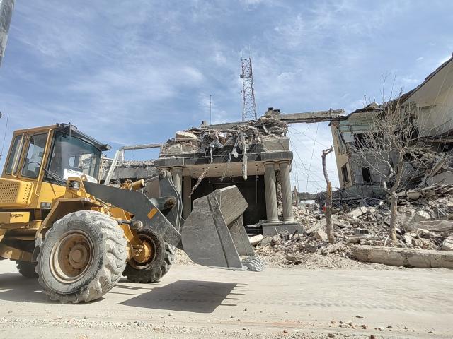 (260304) -- TEHRAN, March 4, 2026 (Xinhua) -- This photo taken on March 4, 2026 shows damaged buildings near the Enghelab Square in Tehran, Iran. (Xinhua/Shadati)