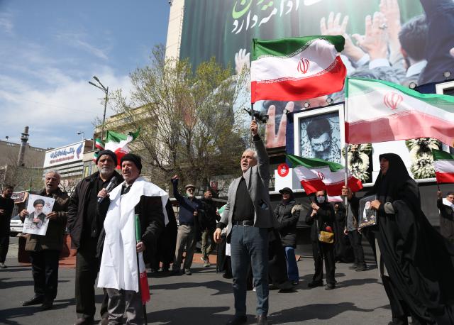 (260304) -- TEHRAN, March 4, 2026 (Xinhua) -- People protest against U.S. and Israeli military attacks on Iran in Tehran, Iran, on March 4, 2026. (Xinhua/Shadati)
