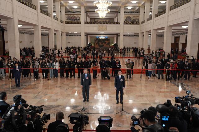 (260305) -- BEIJING, March 5, 2026 (Xinhua) -- Deputies to the 14th National People's Congress (NPC) attend a group interview ahead of the opening meeting of the fourth session of the 14th NPC at the Great Hall of the People in Beijing, capital of China, March 5, 2026. (Xinhua/Wang Xi)
