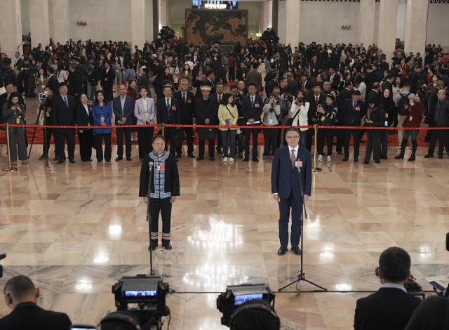(260305) -- BEIJING, March 5, 2026 (Xinhua) -- Deputies to the 14th National People's Congress (NPC) attend a group interview ahead of the opening meeting of the fourth session of the 14th NPC at the Great Hall of the People in Beijing, capital of China, March 5, 2026. (Xinhua/Wang Xi)