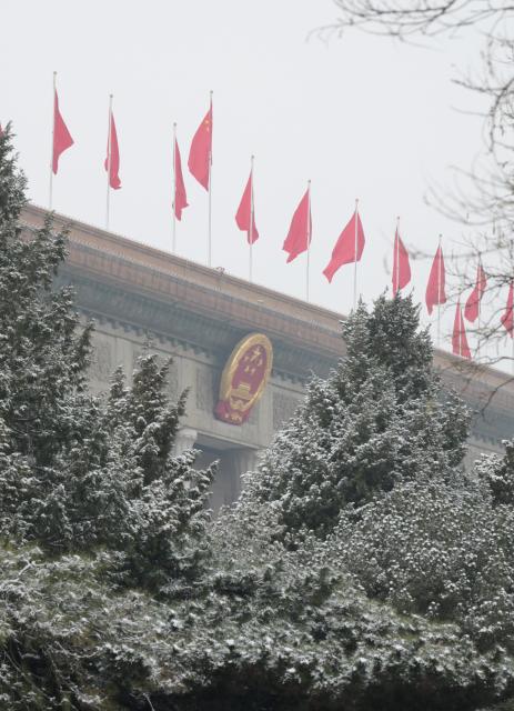 (260305) -- BEIJING, March 5, 2026 (Xinhua) -- This photo taken on March 5, 2026 shows the snow scenery of the Great Hall of the People, the venue for the opening meeting of the fourth session of the 14th National People's Congress (NPC), in Beijing, capital of China. (Xinhua/Li He)