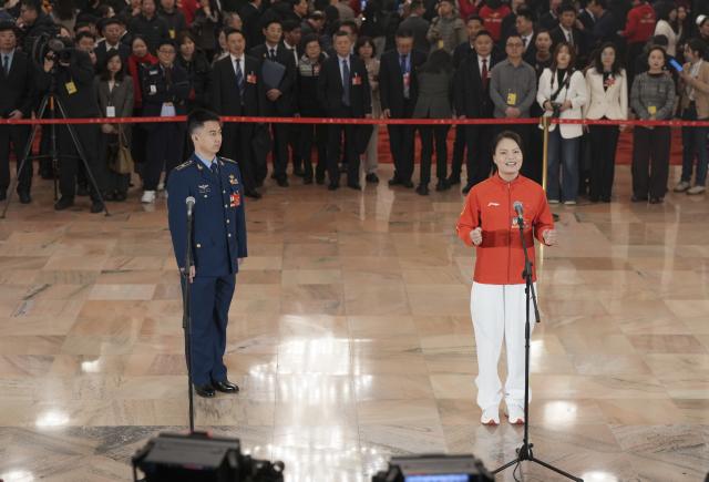 (260305) -- BEIJING, March 5, 2026 (Xinhua) -- Deputies to the 14th National People's Congress (NPC) attend a group interview ahead of the opening meeting of the fourth session of the 14th NPC at the Great Hall of the People in Beijing, capital of China, March 5, 2026. (Xinhua/Wang Xi)