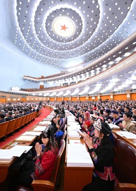 (260305) -- BEIJING, March 5, 2026 (Xinhua) -- The opening meeting of the fourth session of the 14th National People's Congress (NPC) is held at the Great Hall of the People in Beijing, capital of China, March 5, 2026. (Xinhua/Li Xiang)