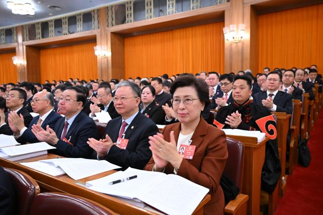 (260305) -- BEIJING, March 5, 2026 (Xinhua) -- The opening meeting of the fourth session of the 14th National People's Congress (NPC) is held at the Great Hall of the People in Beijing, capital of China, March 5, 2026. (Xinhua/Yan Yan)