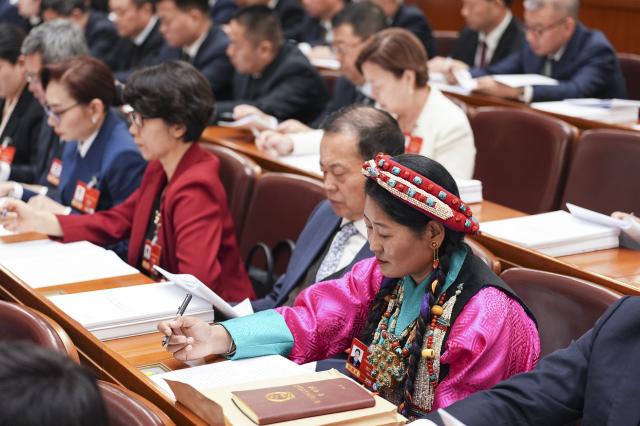 (260305) -- BEIJING, March 5, 2026 (Xinhua) -- The opening meeting of the fourth session of the 14th National People's Congress (NPC) is held at the Great Hall of the People in Beijing, capital of China, March 5, 2026. (Xinhua/Xing Guangli)