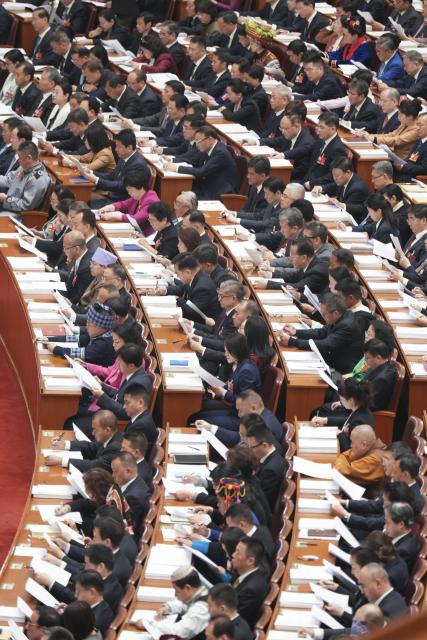 (260305) -- BEIJING, March 5, 2026 (Xinhua) -- The opening meeting of the fourth session of the 14th National People's Congress (NPC) is held at the Great Hall of the People in Beijing, capital of China, March 5, 2026. (Xinhua/Wang Xi)