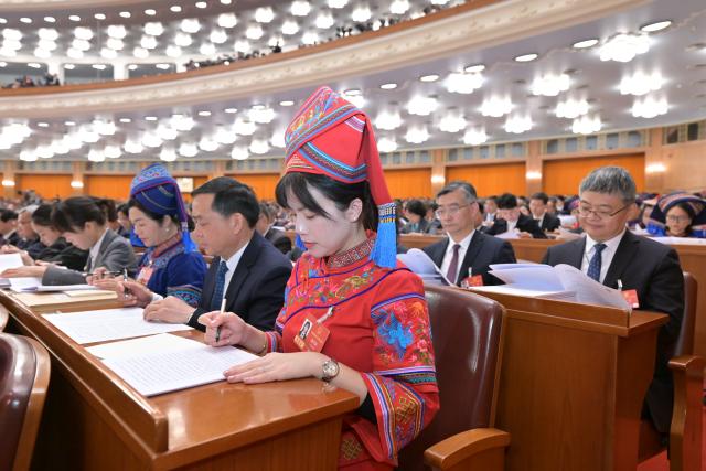 (260305) -- BEIJING, March 5, 2026 (Xinhua) -- The opening meeting of the fourth session of the 14th National People's Congress (NPC) is held at the Great Hall of the People in Beijing, capital of China, March 5, 2026. (Xinhua/Gao Jie)