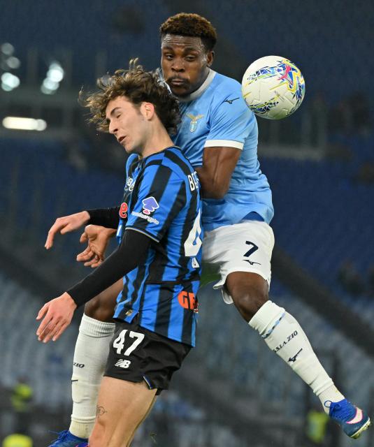 (260305) -- ROME, March 5, 2026 (Xinhua) -- Atalanta's Lorenzo Bernasconi (L) vies with Lazio's Fisayo Dele-Bashiru during the Italian Cup semifinal 1st leg match between Lazio and Atalanta in Rome, Italy, March 4, 2026. (Photo by Alberto Lingria/Xinhua)