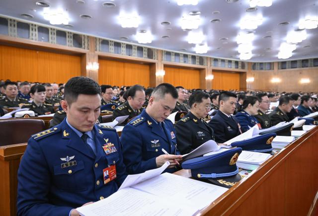 (260305) -- BEIJING, March 5, 2026 (Xinhua) -- The opening meeting of the fourth session of the 14th National People's Congress (NPC) is held at the Great Hall of the People in Beijing, capital of China, March 5, 2026. (Xinhua/Shen Hong)
