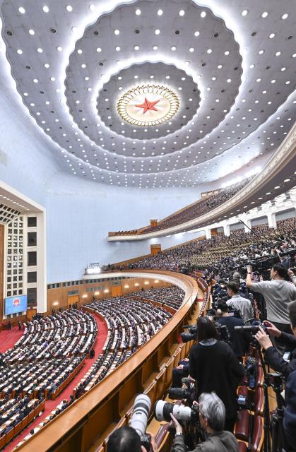 (260305) -- BEIJING, March 5, 2026 (Xinhua) -- The opening meeting of the fourth session of the 14th National People's Congress (NPC) is held at the Great Hall of the People in Beijing, capital of China, March 5, 2026. (Xinhua/Li Xin)