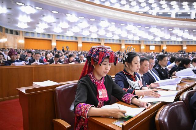 (260305) -- BEIJING, March 5, 2026 (Xinhua) -- The opening meeting of the fourth session of the 14th National People's Congress (NPC) is held at the Great Hall of the People in Beijing, capital of China, March 5, 2026. (Xinhua/Shen Hong)