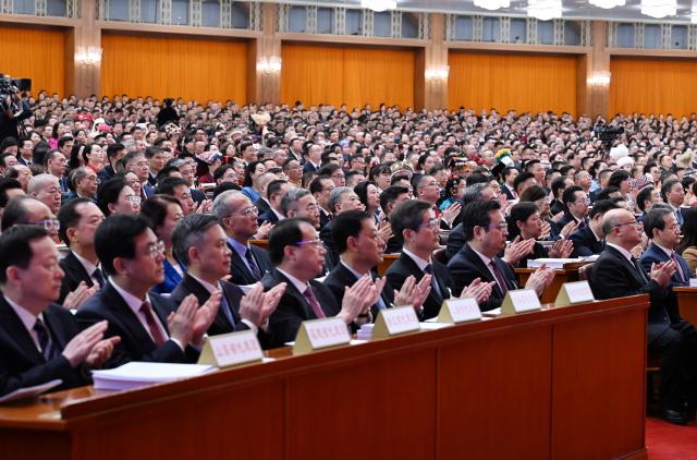 (260305) -- BEIJING, March 5, 2026 (Xinhua) -- The opening meeting of the fourth session of the 14th National People's Congress (NPC) is held at the Great Hall of the People in Beijing, capital of China, March 5, 2026. (Xinhua/Rao Aimin)