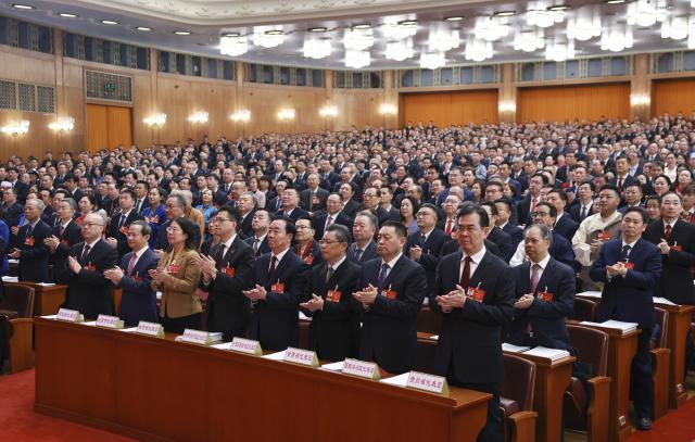 (260305) -- BEIJING, March 5, 2026 (Xinhua) -- The opening meeting of the fourth session of the 14th National People's Congress (NPC) is held at the Great Hall of the People in Beijing, capital of China, March 5, 2026. (Xinhua/Ding Haitao)