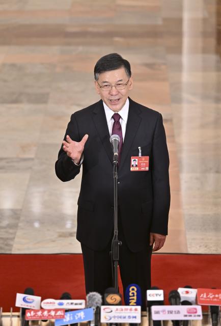 (260305) -- BEIJING, March 5, 2026 (Xinhua) -- Chinese Minister of Science and Technology Yin Hejun gives an interview after the opening meeting of the fourth session of the 14th National People's Congress (NPC) at the Great Hall of the People in Beijing, capital of China, March 5, 2026. (Xinhua/Li Xin)