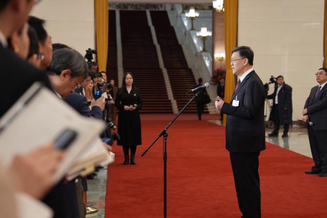 (260305) -- BEIJING, March 5, 2026 (Xinhua) -- Chinese Minister of Science and Technology Yin Hejun gives an interview after the opening meeting of the fourth session of the 14th National People's Congress (NPC) at the Great Hall of the People in Beijing, capital of China, March 5, 2026. (Xinhua/Wang Xi)