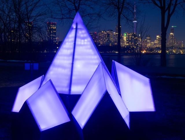 (260305) -- TORONTO, March 5, 2026 (Xinhua) -- A light art installation is seen during the "Lumiere: The Art of Light" exhibition in Toronto, Canada, on March 4, 2026. The annual outdoor light exhibition is held here from Feb. 16 to March 27. (Photo by Zou Zheng/Xinhua)