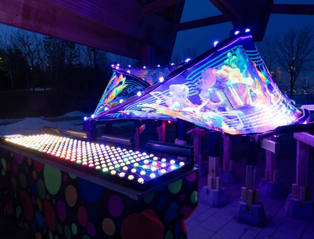 (260305) -- TORONTO, March 5, 2026 (Xinhua) -- A light art installation is seen during the "Lumiere: The Art of Light" exhibition in Toronto, Canada, on March 4, 2026. The annual outdoor light exhibition is held here from Feb. 16 to March 27. (Photo by Zou Zheng/Xinhua)