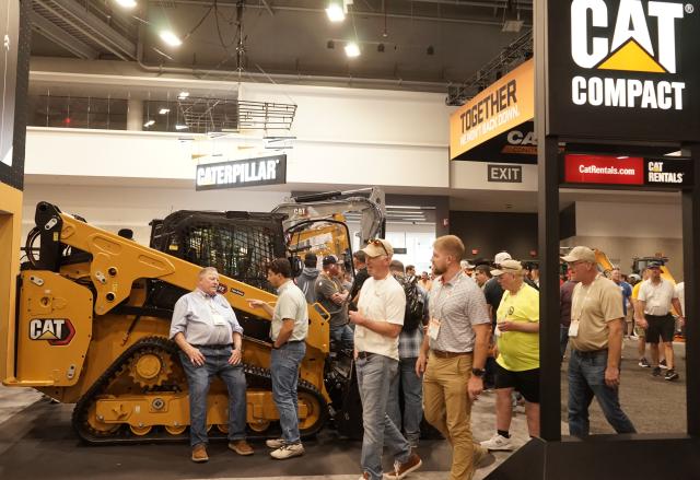 (260305) -- LAS VEGAS, March 5, 2026 (Xinhua) -- People visit the Caterpillar booth at the 2026 CONEXPO-CON/AGG in Las Vegas, the United States, on March 4, 2026. Global construction equipment manufacturers are gathering in Las Vegas from Tuesday to Saturday for the 2026 CONEXPO-CON/AGG, showcasing a broad shift toward artificial intelligence (AI) and autonomous operations. (Photo by Zeng Hui/Xinhua)
