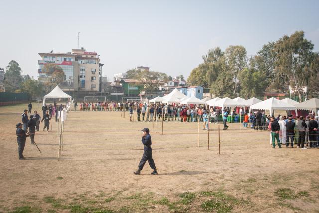 (260305) -- LALITPUR, March 5, 2026 (Xinhua) -- People line up to cast ballots at a polling station during the parliamentary election in Lalitpur, Nepal, on March 5, 2026. Voting began across Nepal on Thursday morning to elect a new House of Representatives that was dissolved following violent protests in September last year. (Photo by Hari Maharjan/Xinhua)
