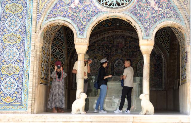 (260305) -- TEHRAN, March 5, 2026 (Xinhua) -- This file photo taken on Aug. 27, 2023 shows tourists visiting the Golestan Palace in Tehran, Iran. The Golestan Palace, a UNESCO World Heritage Site, was partially damaged in air raids during U.S. and Israeli strikes on Iran. (Xinhua/Shadati)