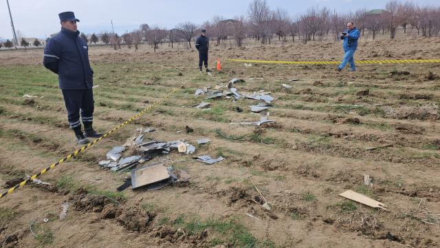 (260305) -- BAKU, March 5, 2026 (Xinhua) -- This photo taken with a mobile phone shows debris of a drone near a school in Nakhchivan Autonomous Republic, March 5, 2026.
  The Azerbaijani Foreign Ministry on Thursday strongly condemned drone attacks on its Nakhchivan Autonomous Republic launched from Iranian territory, calling the strikes a "violation of the norms and principles of international law."
   The attacks took place at around midday on Thursday. One drone struck the terminal building at Nakhchivan International Airport, injuring two civilians and causing structural damage, while another drone fell near a school in the village of Shakarabad, the ministry said in a statement.
   The ministry said the actions would escalate regional tensions and directly contradict the principles of international law.
   Nakhchivan is an Azerbaijani exclave separated from the rest of the country by Armenia and bordering Armenia, Iran and Türkiye. (Azerbaijan State News Agency/Handout via Xinhua)