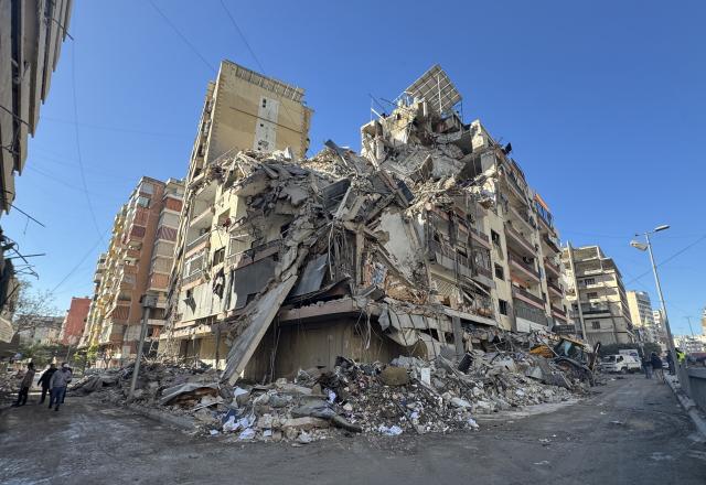 (260305) -- BEIRUT, March 5, 2026 (Xinhua) -- This photo taken on March 5, 2026 shows a building damaged in Israeli airstrikes in a southern suburb of Beirut, Lebanon. A security source from the Lebanese Army told Xinhua that Israeli warplanes and drones carried out 76 airstrikes in eastern and southern Lebanon as well as Beirut's southern suburbs in the early morning hours on Thursday. The source added that 19 artillery strikes were also recorded on Lebanon's border towns. (Photo by Bilal Jawich/Xinhua)