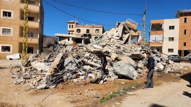 (260305) -- BAALBEK, March 5, 2026 (Xinhua) -- People check the ruins of a building destroyed in an Israeli airstrike in Baalbek, eastern Lebanon on March 5, 2026. The death toll from Israeli attacks in Lebanon since early Monday has risen to 102, with 638 others wounded, Lebanon's authorities said Thursday. (Photo by Taher Abu Hamdan/Xinhua)