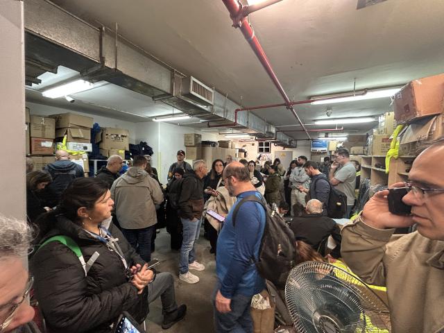 (260305) -- BEN GURION AIRPORT, March 5, 2026 (Xinhua) -- This photo taken with a mobile phone shows people taking cover in a shelter during an air raid alarm at Ben Gurion Airport near Tel Aviv, Israel, on March 5, 2026. (Photo by Gil Cohen Magen/Xinhua)