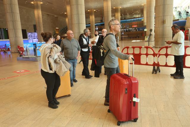 (260305) -- BEN GURION AIRPORT, March 5, 2026 (Xinhua) -- Israelis returning home from abroad arrive at Ben Gurion Airport near Tel Aviv, Israel, on March 5, 2026. (Photo by Gil Cohen Magen/Xinhua)