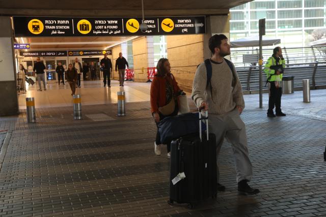 (260305) -- BEN GURION AIRPORT, March 5, 2026 (Xinhua) -- Israelis returning home from abroad arrive at Ben Gurion Airport near Tel Aviv, Israel, on March 5, 2026. (Photo by Gil Cohen Magen/Xinhua)