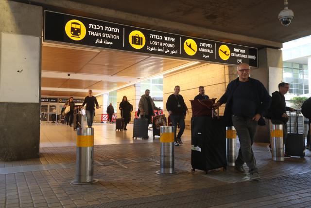 (260305) -- BEN GURION AIRPORT, March 5, 2026 (Xinhua) -- Israelis returning home from abroad arrive at Ben Gurion Airport near Tel Aviv, Israel, on March 5, 2026. (Photo by Gil Cohen Magen/Xinhua)