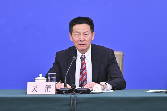 (260306) -- BEIJING, March 6, 2026 (Xinhua) -- Wu Qing, chairman of the China Securities Regulatory Commission, attends a press conference for the fourth session of the 14th National People's Congress (NPC) on economy in Beijing, capital of China, March 6, 2026. (Xinhua/Li Xin)