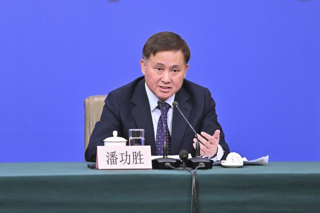 (260306) -- BEIJING, March 6, 2026 (Xinhua) -- Pan Gongsheng, governor of the People's Bank of China, attends a press conference for the fourth session of the 14th National People's Congress (NPC) on economy in Beijing, capital of China, March 6, 2026. (Xinhua/Li Xin)