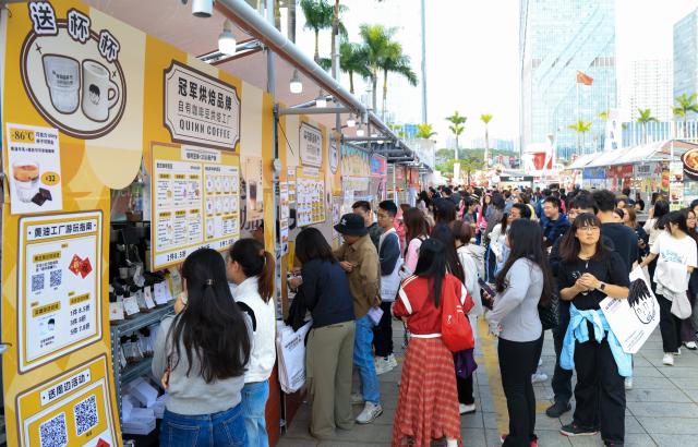 (260306) -- JIANGMEN, March 6, 2026 (Xinhua) -- Consumers attend the 4th Jiangmen Coffee Culture Festival in Jiangmen, south China's Guangdong Province, March 5, 2026. The festival kicked off here on Thursday, gathering more than 330 coffee brands from 13 countries and regions to showcase a full range of products including premium coffee, high-quality coffee raw materials, advanced coffee machines and elegant coffee gear. (Xinhua/Mao Siqian)